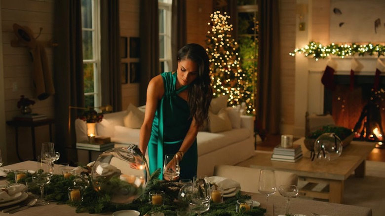 Meghan Markle wearing a shiny green dress on the "With Love, Meghan" holiday special