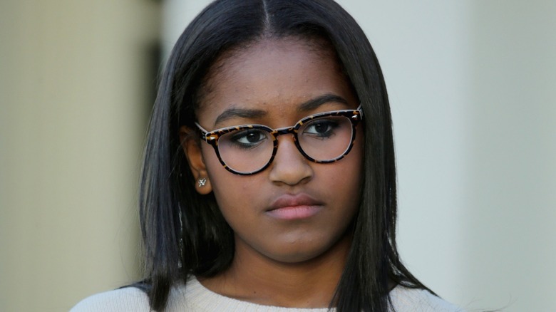 Sasha Obama with a neutral expression