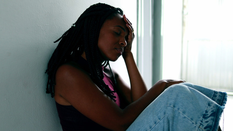 Woman sitting alone 