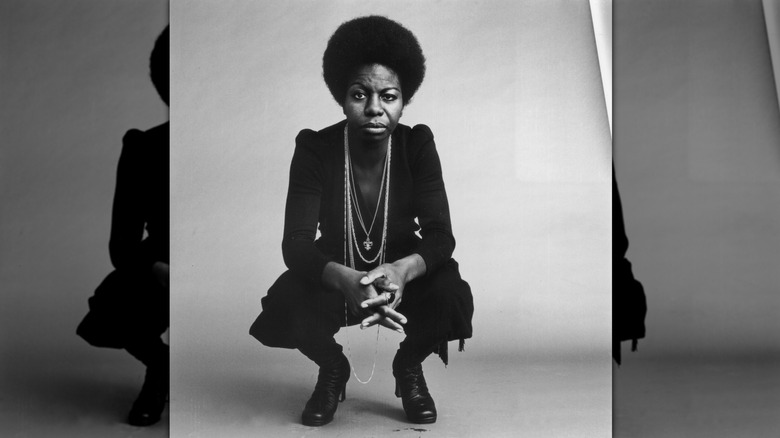 Nina Simone poses with an Afro