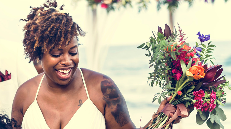 smiling bride on beach