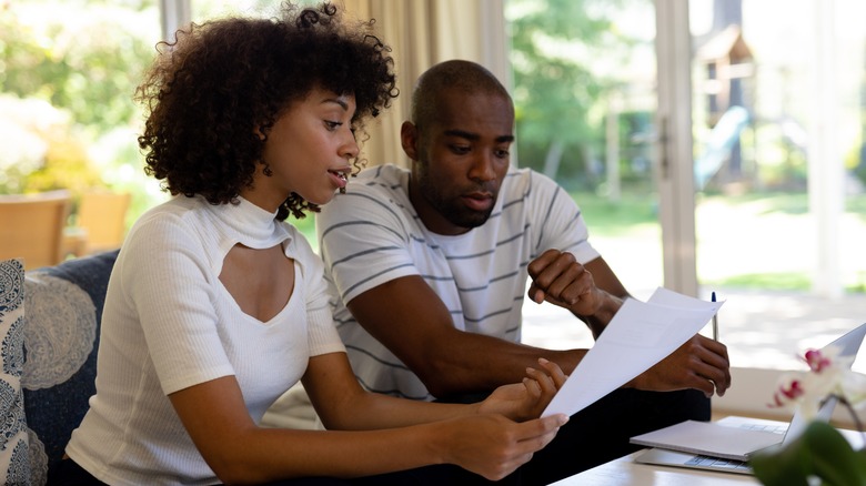 Couple looking at finances