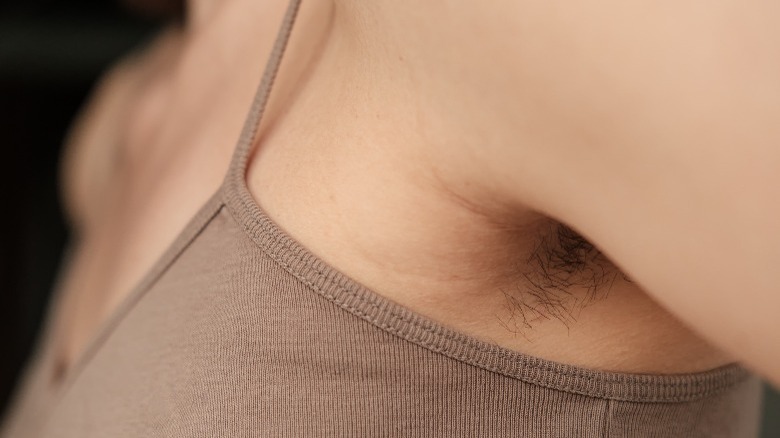 Woman with armpit hair