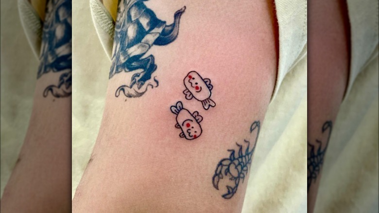 Cartoon fish tattoo