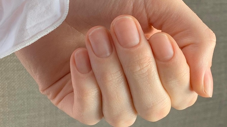 Hand with clean cuticles
