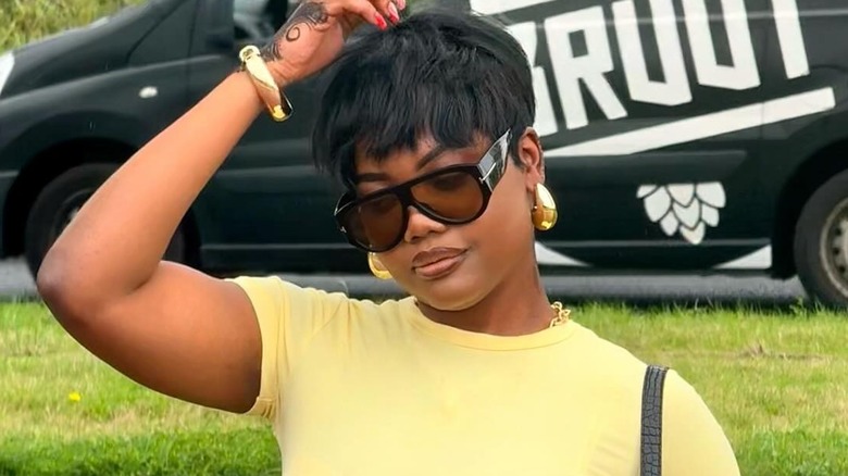 A woman with a pixie haircut