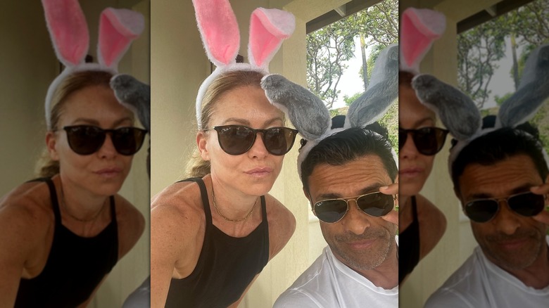 Kelly Ripa and Mark Consuelos wearing rabbit ears during Easter in 2023