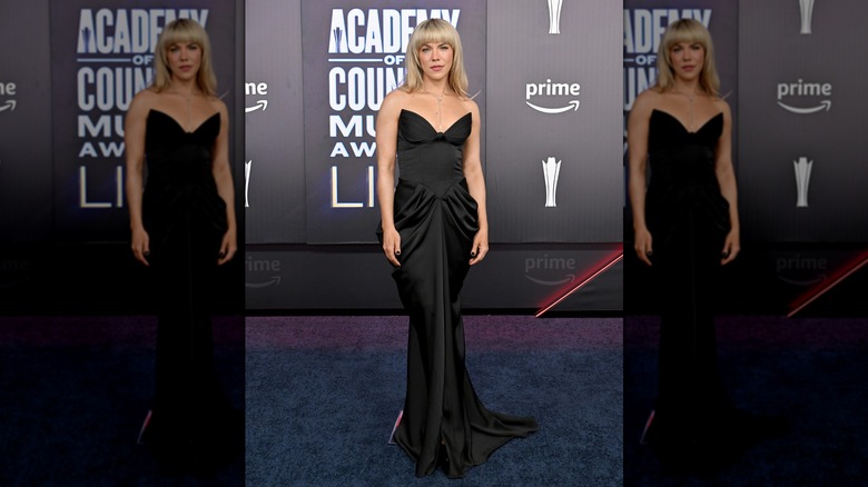 Kimberly Perry in a strapless black dress on the 2026 ACM Awards red carpet