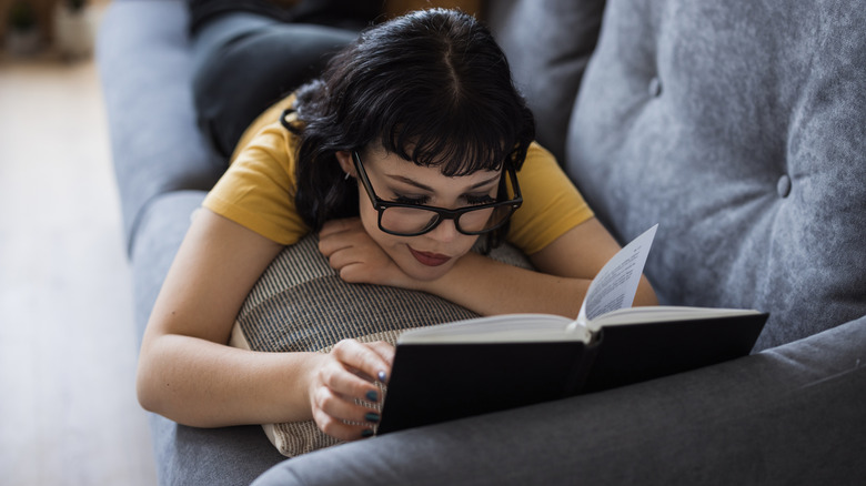 Woman reading on the couch