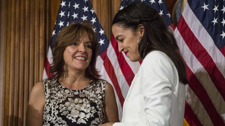 Alexandria Ocasio-Cortez alongside her mother, Blanca Ocasio-Cortez, during mock swearing in ceremony in 2019