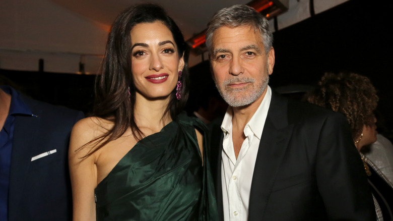 George and Amal Clooney at an event