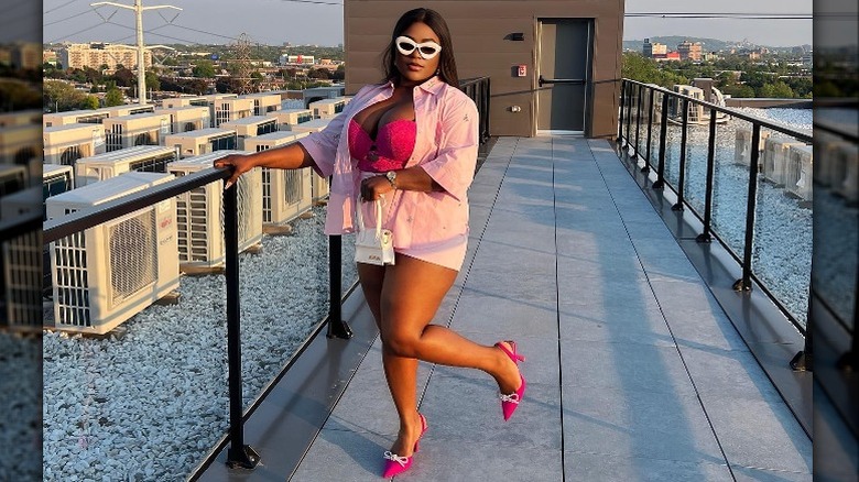 Woman in pink outfit