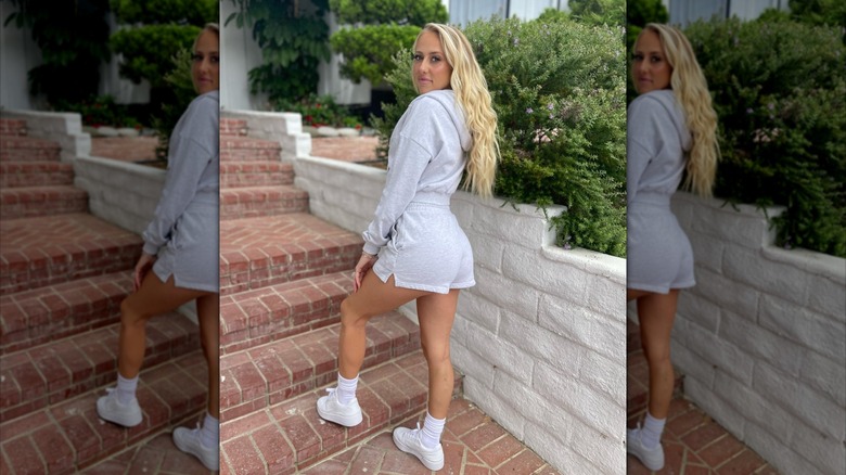 Brittany Mahomes posing in casual shorts