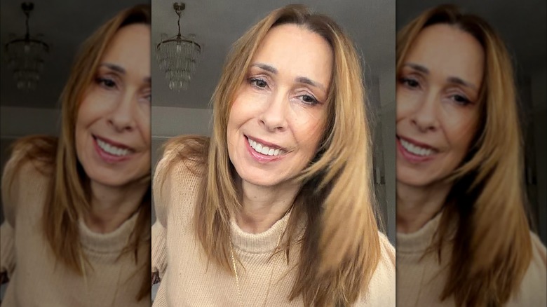 A woman wearing frosty makeup