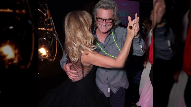 Kurt Russell and Goldie Hawn dancing