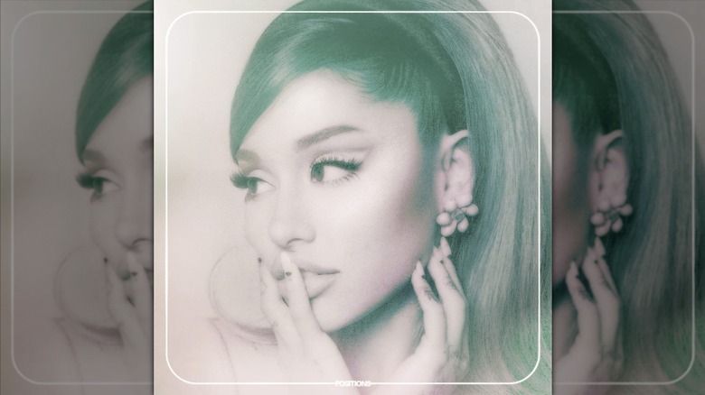 Cover of Ariana Grande's album "Positions," featuring the singer with a retro-inspired makeup look