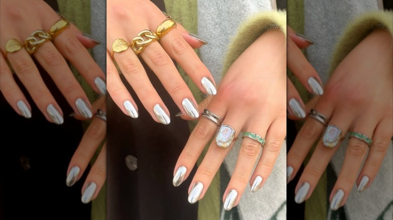 Hands with silver-gold manicure nails