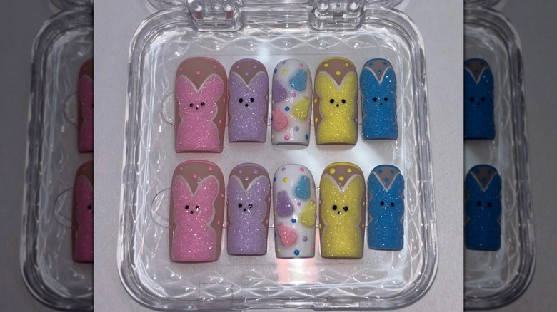 A set of press-on nails featuring sparkly peeps and polka-dots
