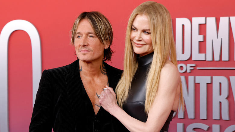 Nicole Kidman and Keith Urban smiling on the red carpet in 2025