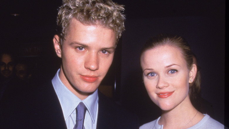 Ryan Phillippe and Reese Witherspoon smiling in 1998