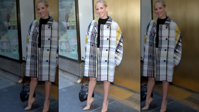 Sarah Michelle Gellar wearing a striped jacket and skirt