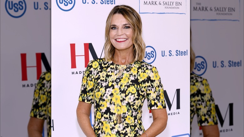 Savannah Guthrie wearing a vibrant red lipstick at the 31st Annual White House Correspondents' Garden Brunch