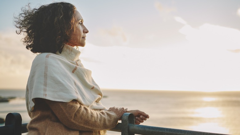 A woman looking out over the ocean