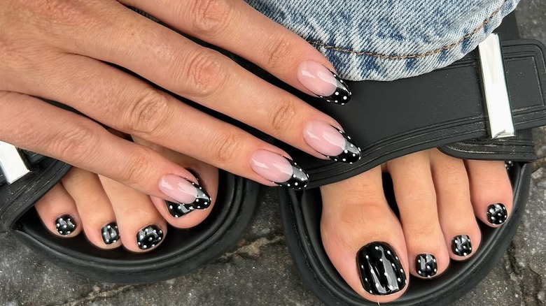 Black and white polka dot design manicure and pedicure