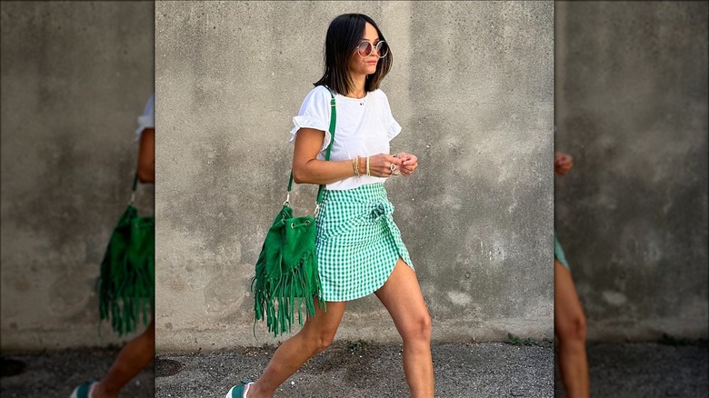 Woman with a green bag