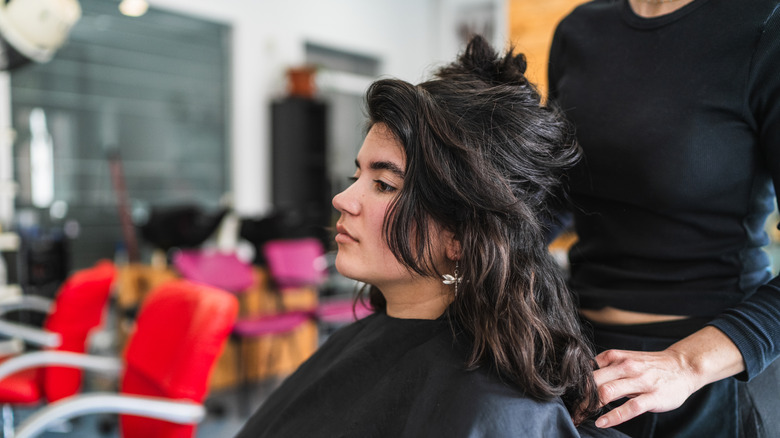 Brunette woman at a hair salon