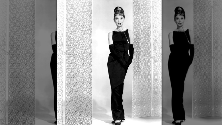 Audrey Hepburn posing in the little black dress in 1961