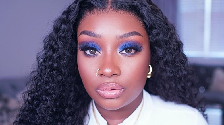 Woman wearing blue eyeshadow