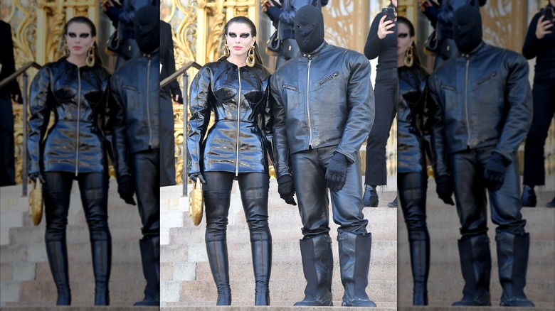 Julia Fox and Kanye West in matching black leather outfits in 2022