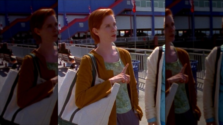 Miranda Hobbes wearing a suede duster and L.L. Bean tote