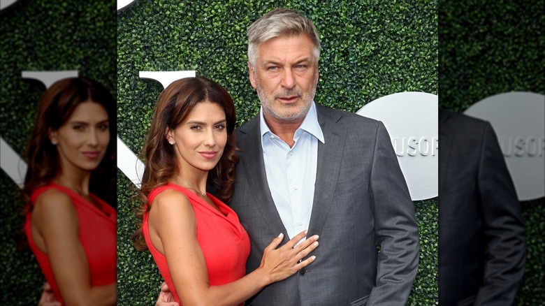 Hilaria Baldwin and Alec Baldwin posing for a photo together on a red carpet