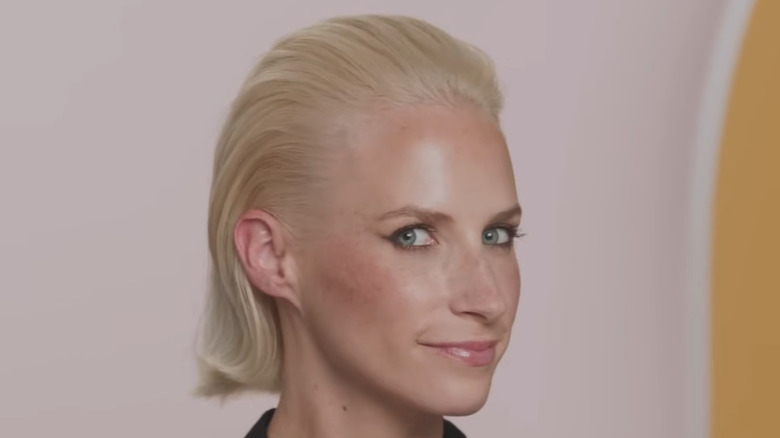Blonde slicked back hair