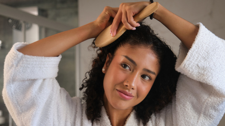 Woman brushing her hair