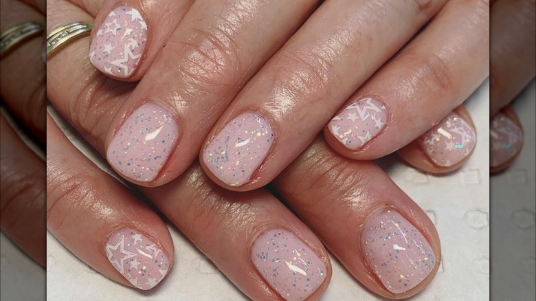 Sparkly manicure with stars