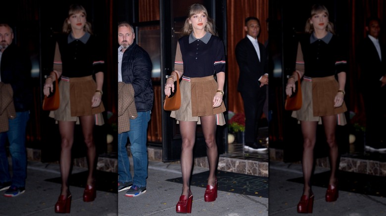 Taylor Swift photographed in New York City wearing an preppy outfit with chunky red heels
