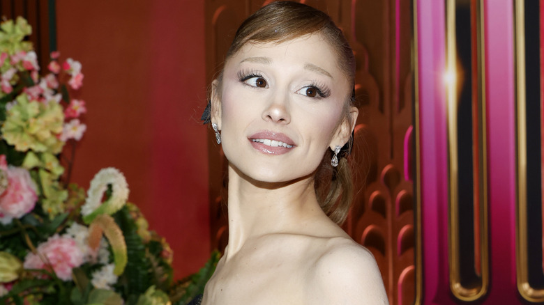 Ariana Grande looking over her shoulder at the US premiere of 