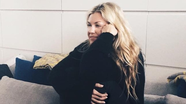 Erika Kirk in a no makeup photo with her natural waves