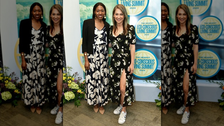 Ginger Zee posing with Monique Valeris while wearing a slitted sundress and sneakers