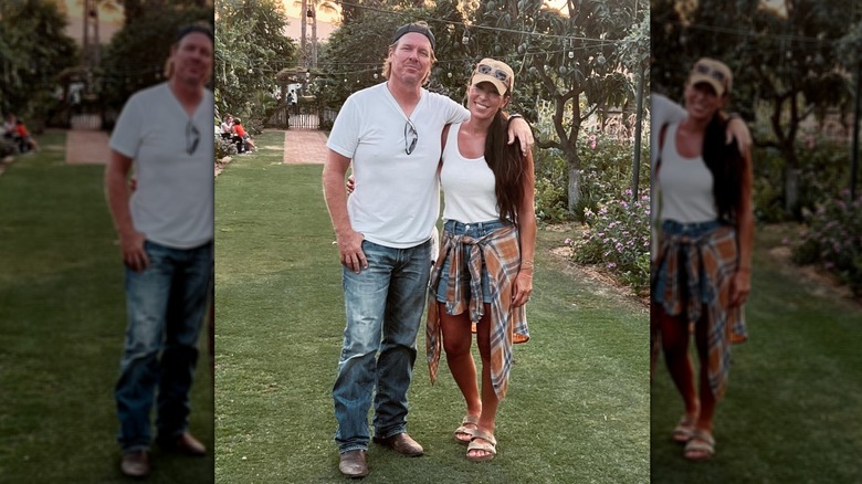 Chip and Joanna Gaines standing outside