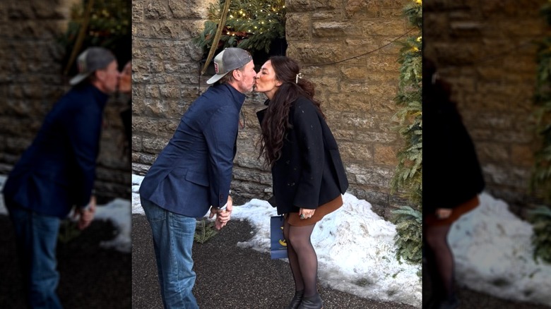 Chip and Joanna Gaines kissing outside