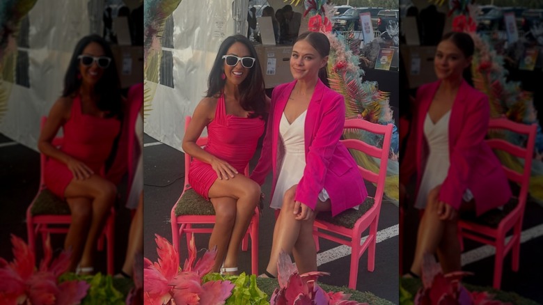 Lauren Boebert and Raven Finegan posing together, sitting on matching pink chairs