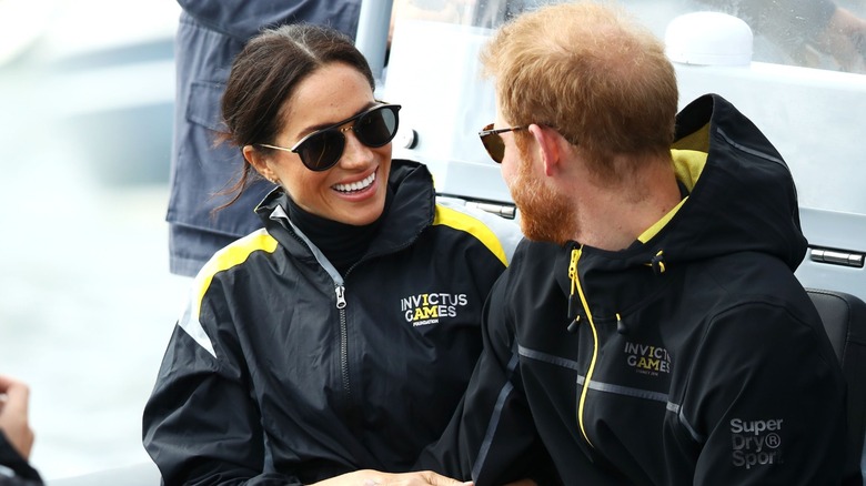 Meghan and Harry wear matching jackets at Invictus Games in Sydney 2018