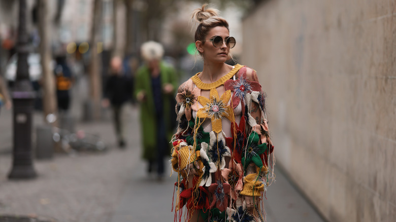 Woman in a crochet sweater 