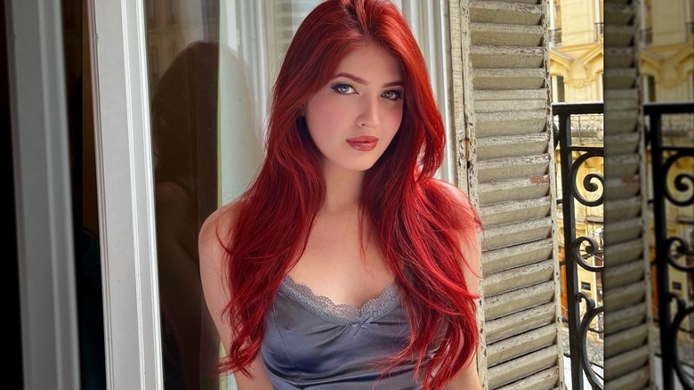 Woman with bright red hair