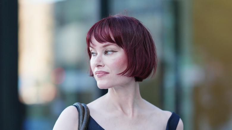 Woman with red hair in a bob
