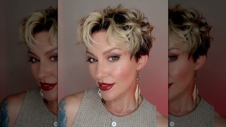 A woman with a longer Pixie haircut